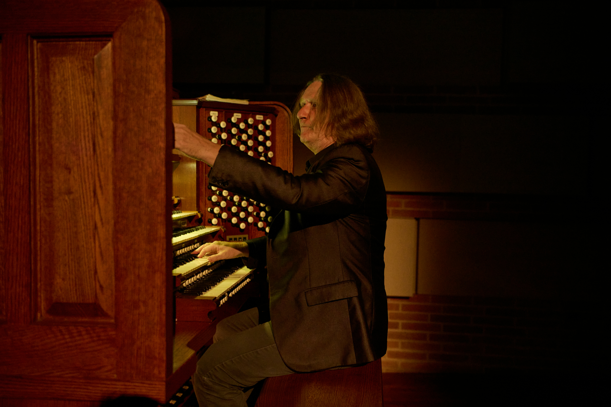 Juneteenth Day a man playing the organ on stage